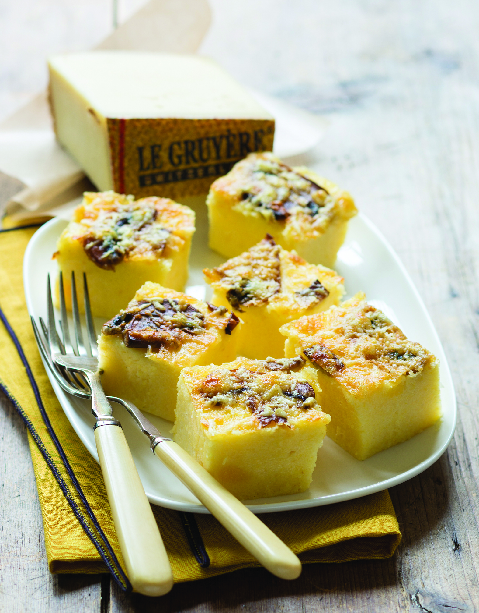 CUBETTI DI POLENTA CON FUNGHI E GRUYÈRE DOP